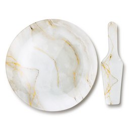 White marble cake plate with gold veining, round shape, includes matching server utensil.