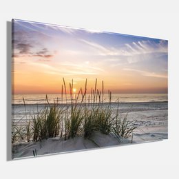 A wooden stretcher frame measuring 60x90 cm, suitable for wall art displays. The frame features a natural, rustic design that complements the serene beach scene in the background, with tall grasses and a beautiful sunset over the ocean.