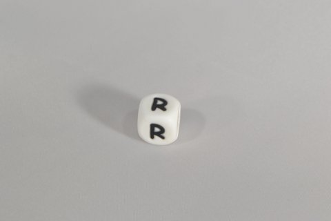 Perlensilikonbuchstabe R.