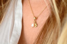 Blomster- og perlehalskæde - guld