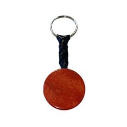 Red jasper keyring with a round disc shape, made of natural stone material.