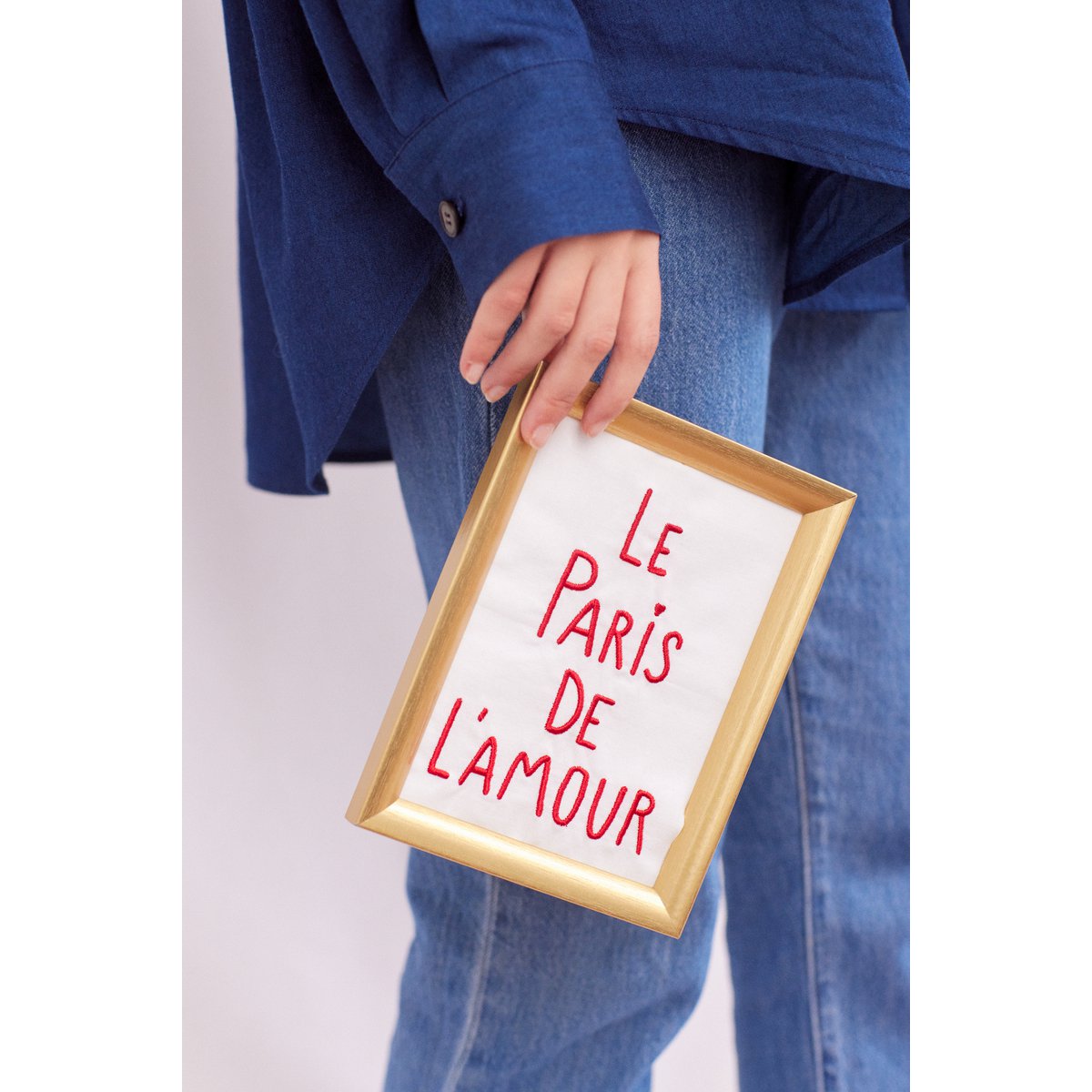 Paris in embroidered cotton frame