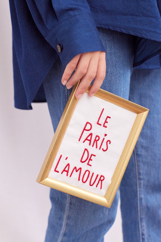 Paris in embroidered cotton frame