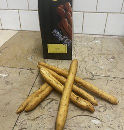 Long, thin, golden-brown crackers with a savory flavor, made with nepita herbs.