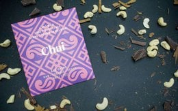Purple chai chocolate bar 50% cocoa, geometric patterned packaging, dark chocolate pieces with spices