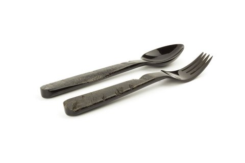 Small flat cutlery in raw black horn