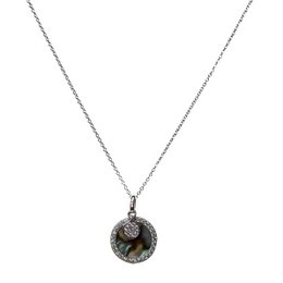 Elegant silver-tone necklace with a round pendant featuring a natural stone and sparkling crystals.