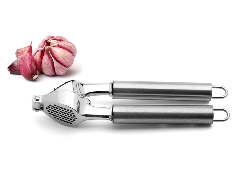 Garlic press with tubular handles
