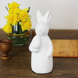Easter bunny with rustic white egg