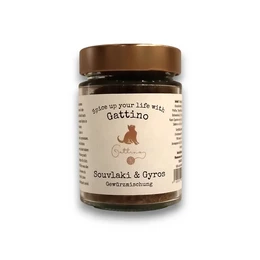  Harissa spice mixture, a blend of chili peppers, garlic, cumin, and other spices, with a vibrant orange-red color and a complex, aromatic flavor profile.