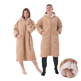 Oversized beige hoodie blanket with zipper closure, unisex design suitable for both men and women.