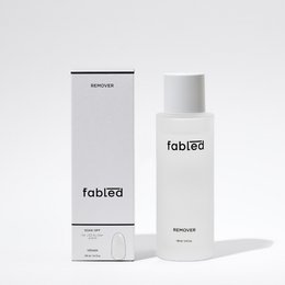 Fabled - Vegan Soak off Remover, a manicure set product in a white bottle with the Fabled logo. The product is designed to remove soak-off nail polish in a vegan and gentle formula.
