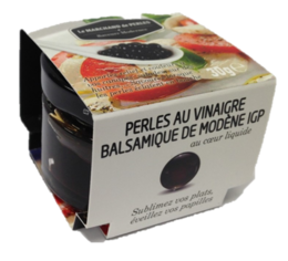 Pearls in balsamic vinegar of Modena, 30gr. Seasoning product featuring pearl-shaped pearls in a balsamic vinegar of Modena sauce.