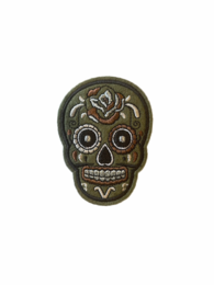 Decorative skull-shaped brooch with intricate floral designs and black accents, suitable for adding a touch of gothic style to any outfit.