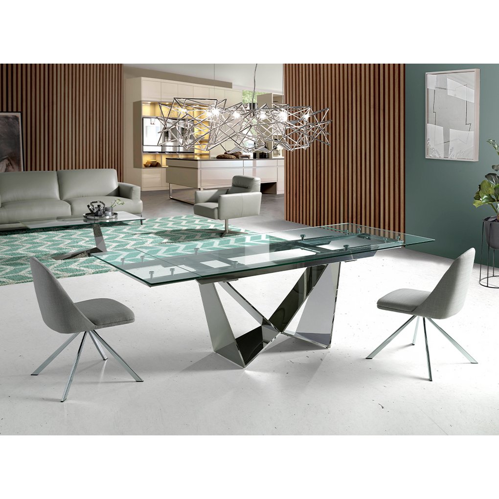 Swivel chair upholstered in fabric with chromed steel legs