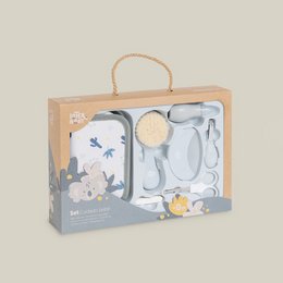 A kids' toiletry bag set containing a comb, brush, and scissors in a wooden box with a rope handle. The set features a floral and animal print design, making it suitable for young children.