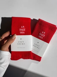 White socks with "Amore" text in red.