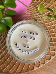Rose quartz gemstone candle with essential oil, unique and valuable design.