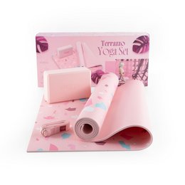 Pink terrazzo yoga mat set with blocks, strap, and towel for beginners.