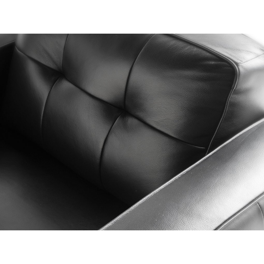 Armchair upholstered in leather and Walnut wood legs
