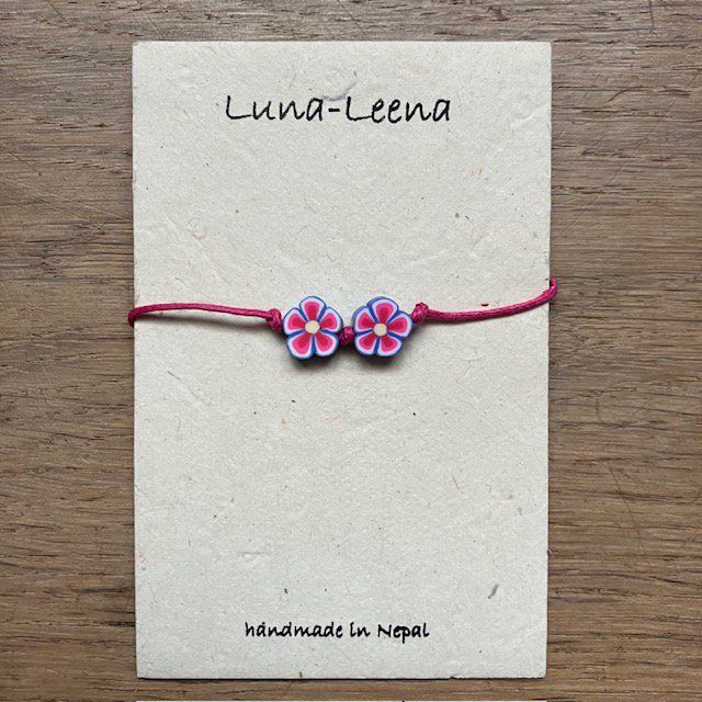 Luna-Leena Kinderarmband Blume lila – handgefertigt in Nepal