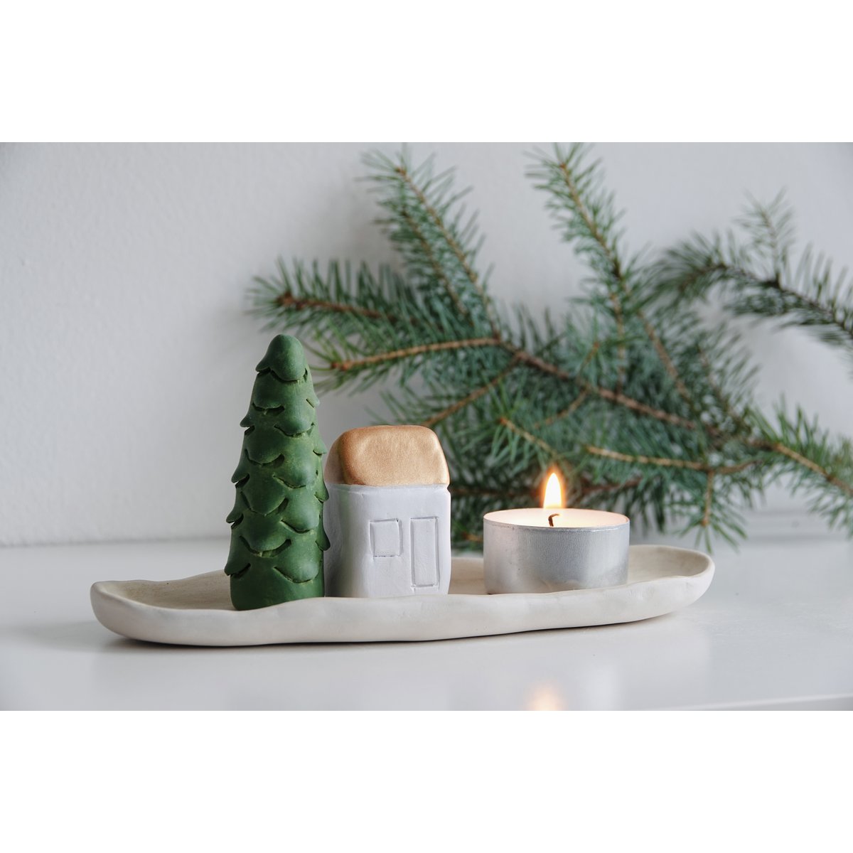 Christmas Giftbox with house, tree and candle