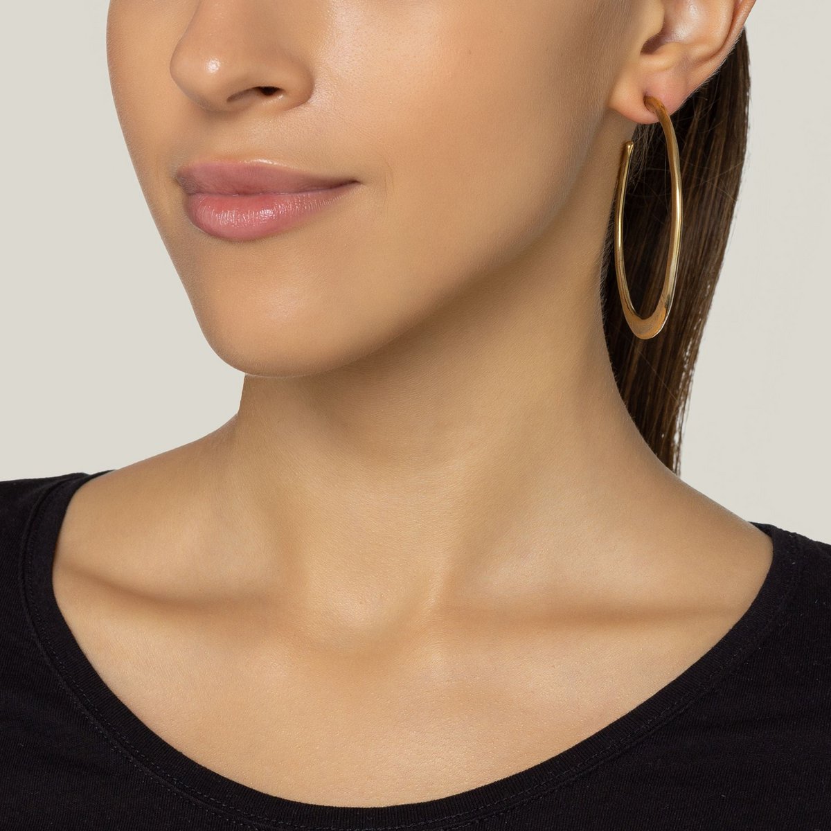 Large gold hoop earring