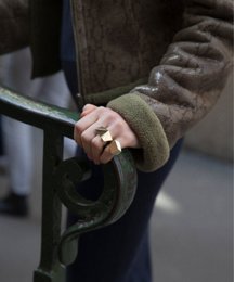 A statement ring with a distorted, asymmetrical design in gold, canon de fusil, and silver color variants. The ring features an abstract, sculptural shape that makes a bold fashion statement.