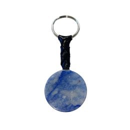 A round, blue quartz disc keyring with a black cord. The quartz disc has a natural, marbled blue color and texture.