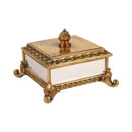 Square gold-colored resin jewelry box with ornate metal trim and a decorative finial on the lid.