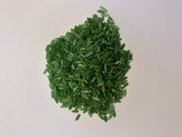 A large, green, leafy candle made of natural materials, suitable for arts and crafts projects.
