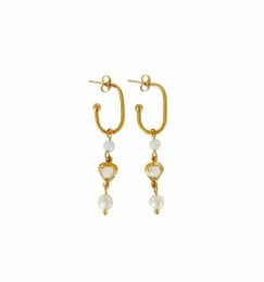 Gold-toned pearl and moonstone earrings with dangling pearl accents.
