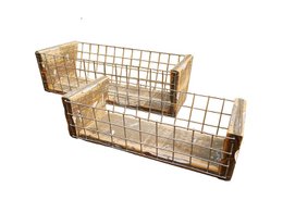 Two rectangular wire baskets in a rustic, vintage style. The baskets appear to be made of metal wire with a natural, weathered finish. They are suitable for storing or displaying various household items.