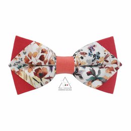 Stylish bow tie with a floral pattern and a coral accent, perfect for formal occasions.