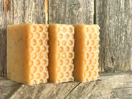Oatmeal soap bar with honeycomb texture, natural and organic ingredients.