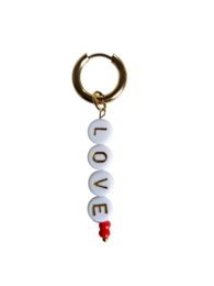 Loose hoop earrings with "LOVE" text charm and red beads.