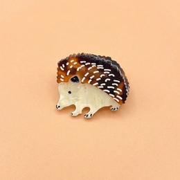 Colorful fish-shaped hair clip made of plastic, available in rose and green colors.