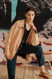 Beige Tencel jacket for women with long sleeves and a relaxed fit.