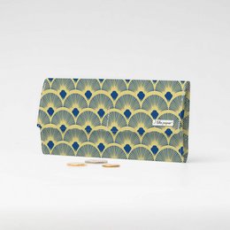 Vintage-inspired tyvek wallet with a retro fan pattern in shades of green and yellow. Durable, water-resistant material makes this a practical and stylish accessory.