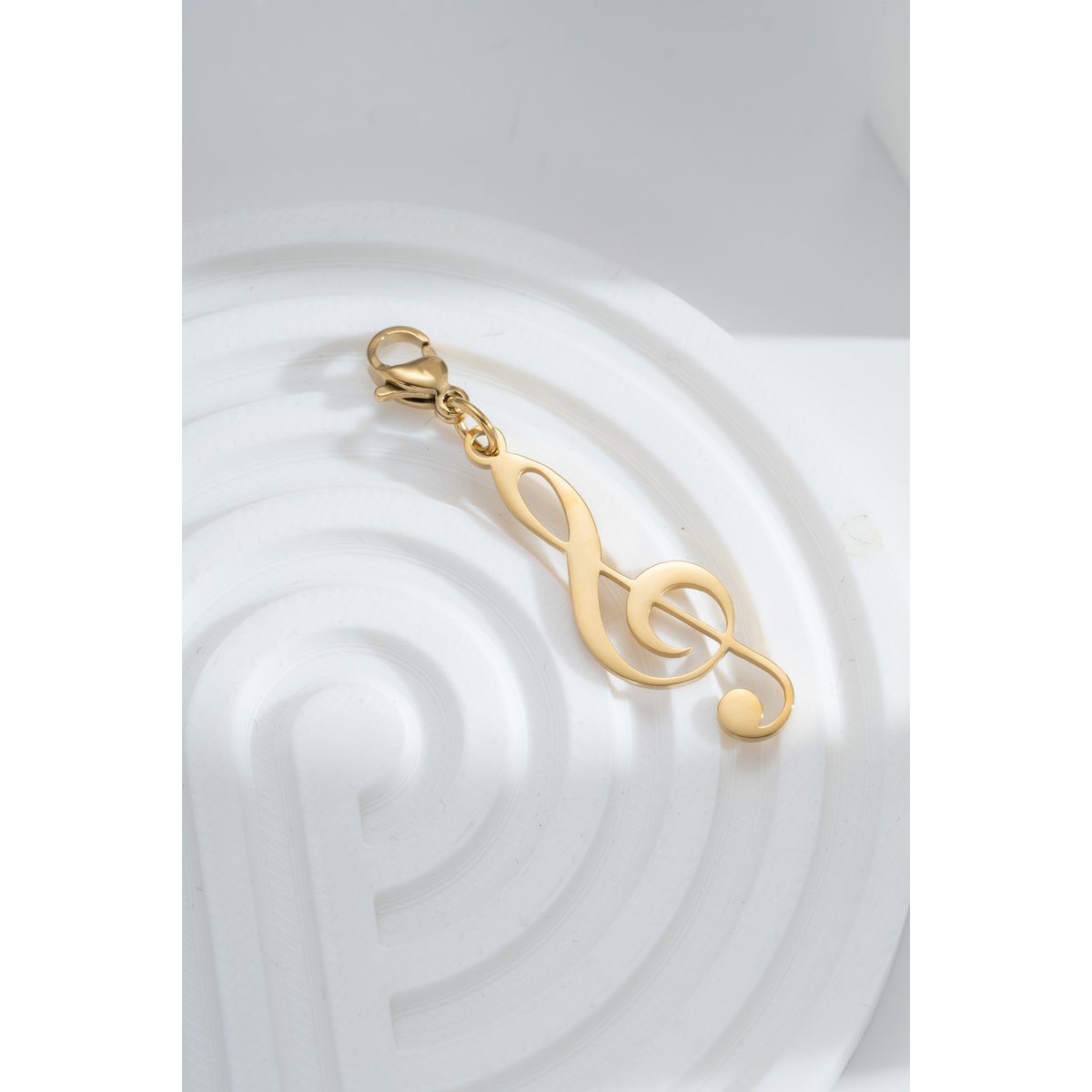 Charm clave de sol dorada en acero, clip musical, elegancia, pasión artística, chic