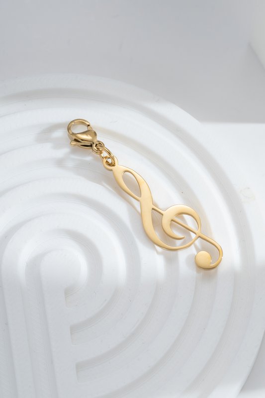 Charm clave de sol dorada en acero, clip musical, elegancia, pasión artística, chic