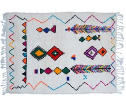 Handmade Berber carpet with vibrant geometric patterns in various colors including red, blue, yellow, and green. The carpet features a traditional Moroccan design with diamond, triangle, and arrow shapes.