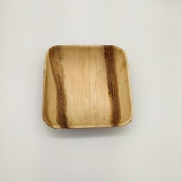 Square palm leaf bowl, set of 10, for party utensils. Natural, eco-friendly material with wood-like texture and striped pattern.