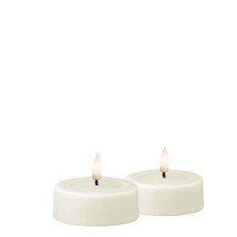 Cream-colored LED candle, 7.5 x 10cm in size, part of the iTRE LED candle collection.