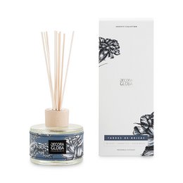 Scented reed diffuser with marine and floral fragrance, 250ml/8.45 fl.oz, in a decorative glass container.