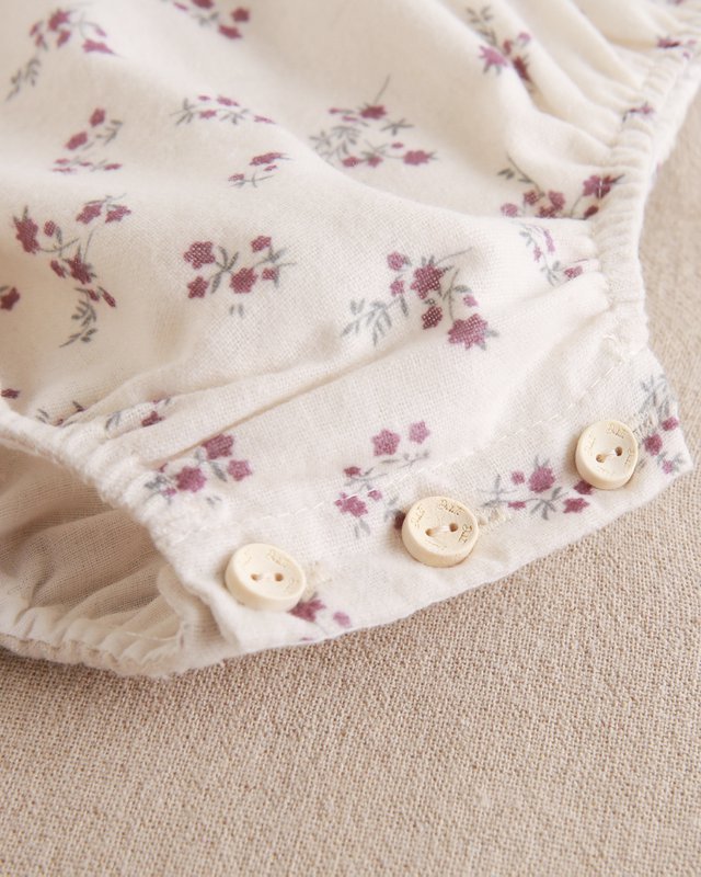 Rompertje met bloemenprint voor babymeisjes met pompondetail P72-11604042