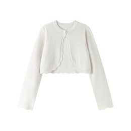 A cropped, long-sleeved white cardigan with a scalloped edge design, suitable for party fashion accessories.