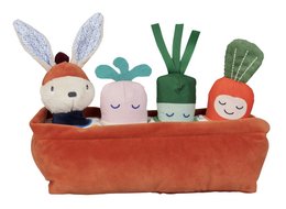 Plush vegetable garden toys with a rabbit, carrots, and other plants in a orange fabric container.