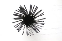 Black bent drinking straws in a 50-pack. Durable plastic straws with a unique curved design for a fun drinking experience.