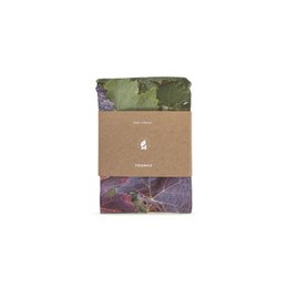 A square decorative pillow cover with a nature-inspired floral and leaf pattern in shades of green, purple, and brown. The pillow cover is made of high-quality materials and is suitable for use in a variety of home decor settings.